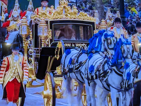 Photo of the carriage heading through London.