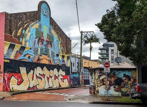 Colourful graffiti in May Lane including an Aboriginal deaths in custody protest.