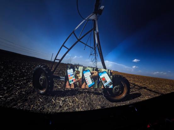 photo - centre pivot irrigation with inset of cell phone apps to help manage