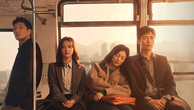 Shot of the leads of the 2022 South Korean drama, "My Liberation Notes" on a train. Son Suk Ku standing, Kim Ji Won sitting, Lee El sitting and leaning on Lee Min Ki.
