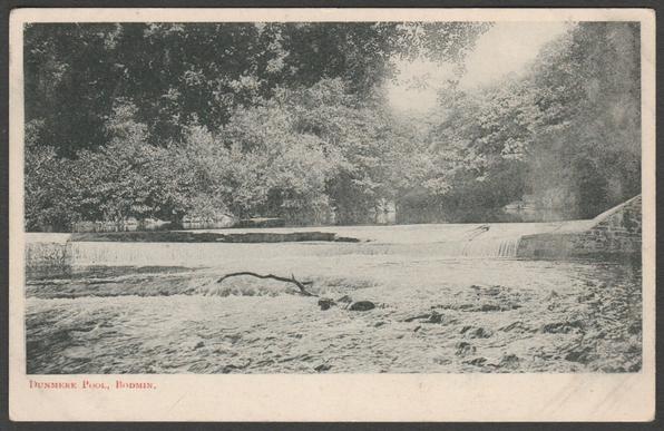 Printed monochrome postcard showing a view of Dunmere Pool at Bodmin in Cornwall.
Publisher not stated, not numbered, c.1905-10.
Postally unused, but stamped with the address of J.E. Rogers, Carsawsen, Mylor, Penryn.
Very good condition, with slight corner bumps and light album marks.