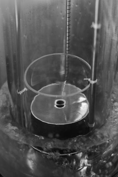 Here superfluid helium whirls in a quantum vortex.