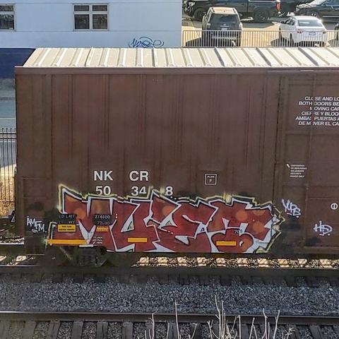 Train car with graffiti rolling through Kamloops BC Canada