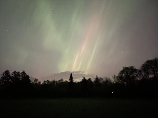 An image of an aurora captured on the 10th of May 2024. The aurora in the image is mostly green.
