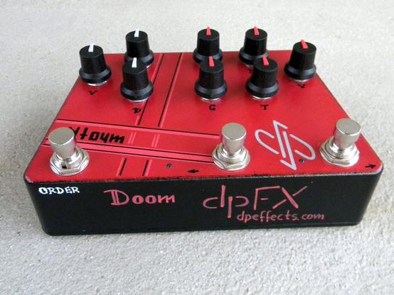 Guitar pedal effect in red enclosure