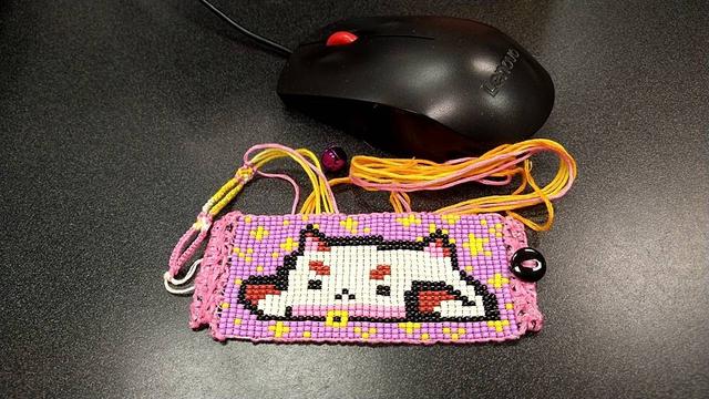 1025 seed beads depicting Puppycat.