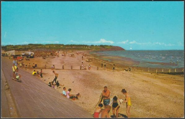 Printed colour postcard showing a view of the beach and seawall at Leysdown-on-Sea on the Isle of Sheppey in Kent.
Publisher not stated, though probably by Photo Precision, No PT4717, c.1960s.
Postally unused.
Very good condition, with extremely slight corner bumps.