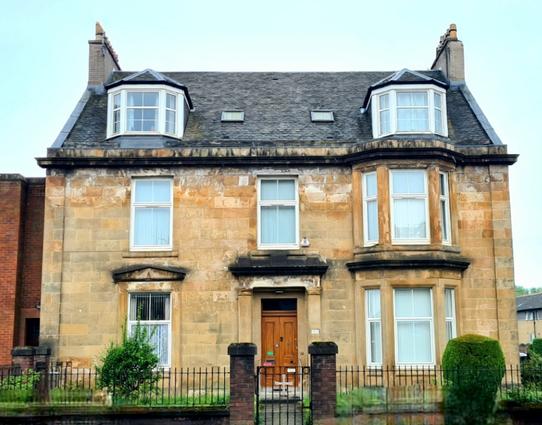 A rather plain-looking Georgian house.