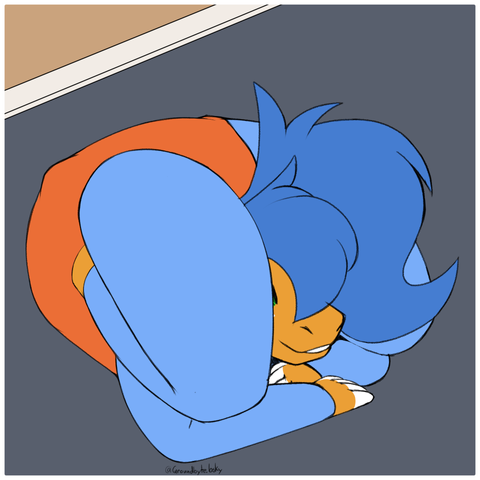 A orange and Blue Mare has folded her body down to a compact size happily showing off her contortionist skills