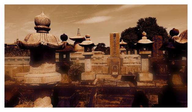 A shot from a cemetery with stone lanterns and head stones. I've changed the color palette to make it darker and browner.