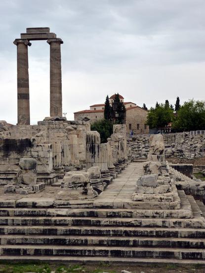 Ancient temple of Apollo with Ionian columns, and steps of the pronaos.