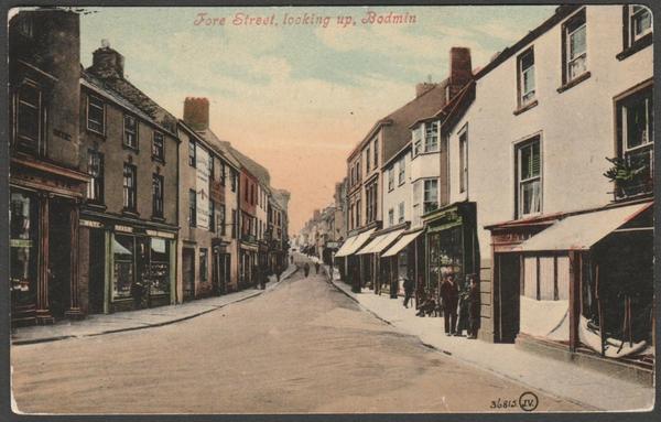 Printed colour postcard showing a view looking up Fore Street in Bodmin, Cornwall.
Published by Valentine & Sons Ltd, Dundee & London, Valentine's Series, Souvenir Post Card, No 36815.
Postally used in 1907, stamp removed, and sent to Miss Barker, 249 Dereham Road, Norwich, Norfolk.
Good condition, with some corner wear.