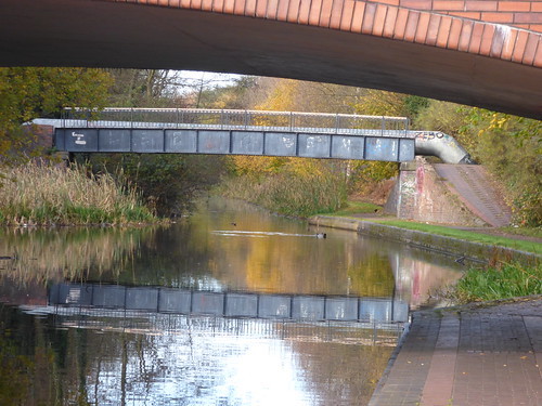 A photo titled "Walsall Canal - Wednesbury - Willingsworth Hall Bridge - Moorcroft Junction Foot and Pipe Bridge", taken near Pipe Bridge by ell brown on Flickr.