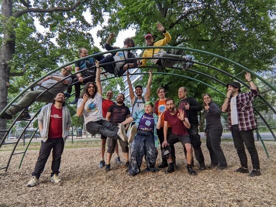 Adults on a playground, worrying about it collapsing under their weight