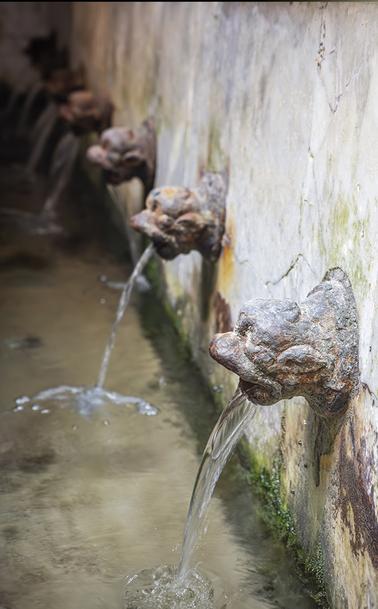 Lion-headed faucets from a medieval wash house in Cefalu Sicily