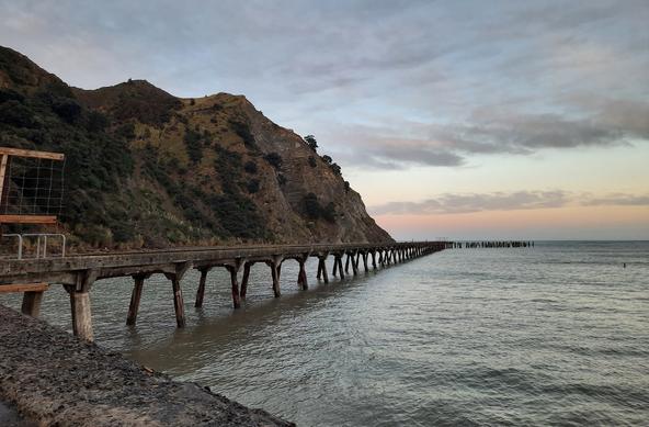 photo - wharf & headlands, Tokomaru Bay, New Zealand