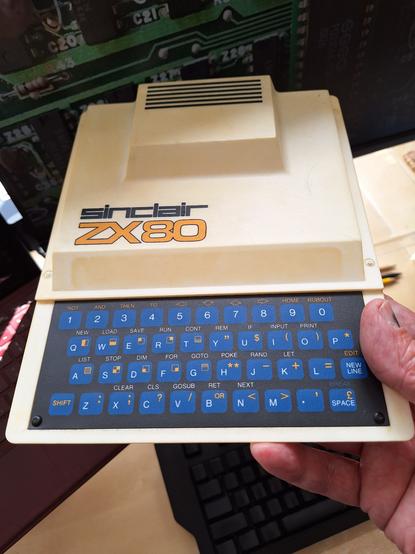 A slightly yellowed Sinclair ZX80 computer