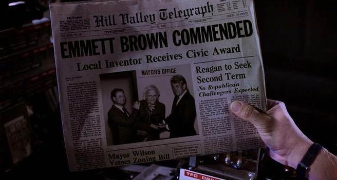 A newspaper headline that reads, "Emmett Brown commended. Local inventor receives civic award"