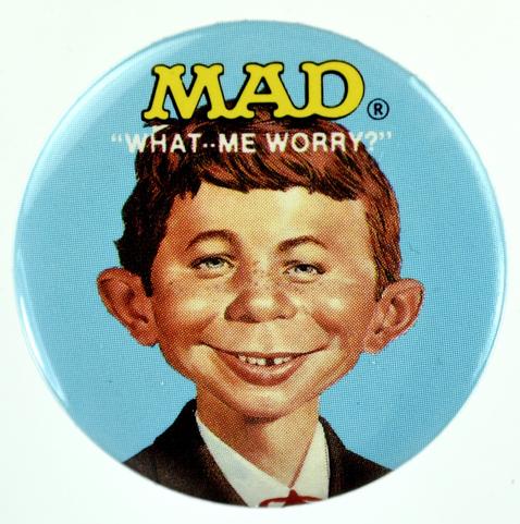 MAD Magazine's Alfred E. Neuman with the famous quote "WHAT--ME WORRY?" written across the top of his head.