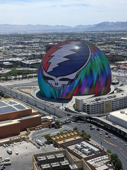 View of the Sphere from my room.  A large SYF logo is on it with a tie-dye pattern surrounding.
