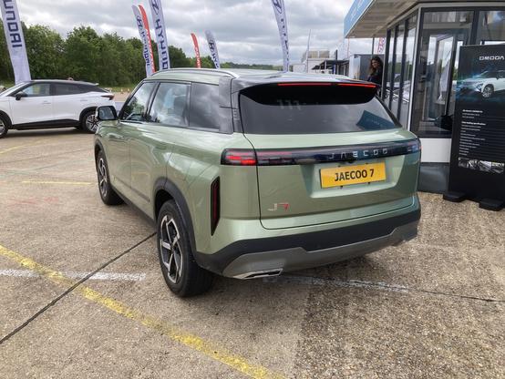 Green metallic Jaecoo J7, rear quarter view