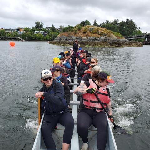 Our team, in dragon boat, braking to hold.
