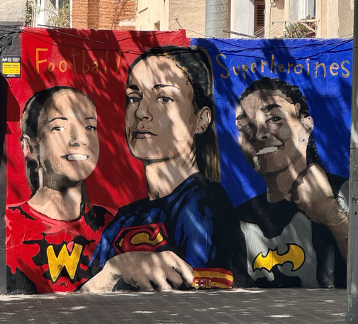Mural of Aitana, Alexia and Salma as Wonder Woman, Superwoman and Batwoman