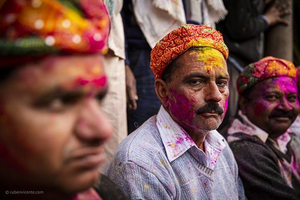 Men covered with gulal during Nandgaon Holi. India