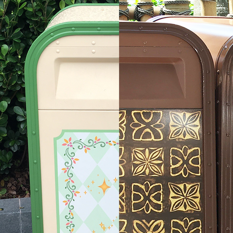 A split image showing two differently designed trash cans side by side; the left side features a cream-colored bin with green trim and floral decorations, while the right side displays a brown bin with golden geometric patterns.