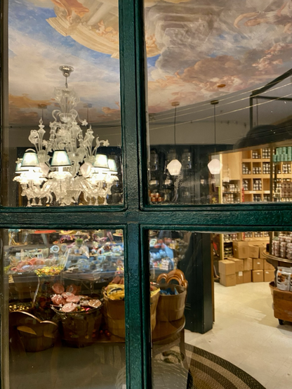 Peering through window into neighbourhood market that is a ‘stunning’ exploration of product and display. Truly amazing.
