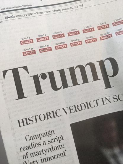 A close-up of the Washington Post's May 31, 2024 front page, showing the first word of its "Trump found guilty" headline and part of the graphic above that headline itemizing the 34 counts.