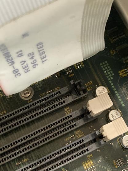 The SIMM socket is broken and missing its latch