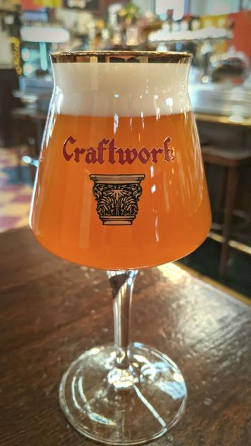 Close-up of a glass of Good Lord tripel by Craftwork Brewery at Craftwork Brewery in Oamaru, New Zealand.