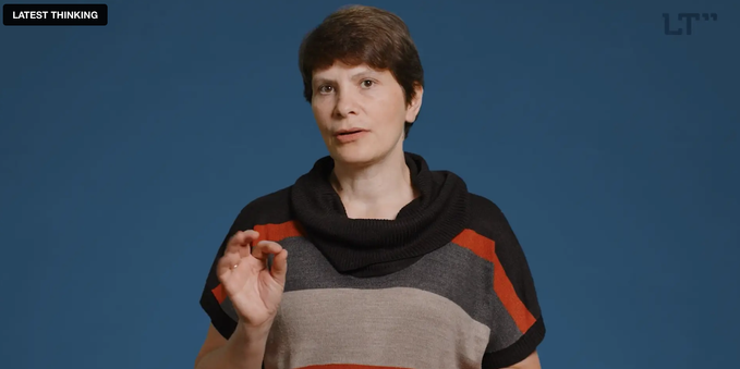 Screenshot of scientist talking in the video.