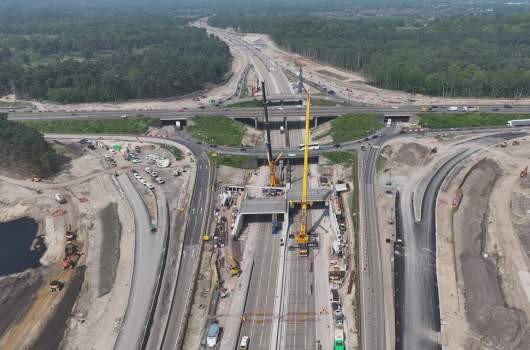 An aerial photo of J10 of the M25 showing huge construction and widening in progress