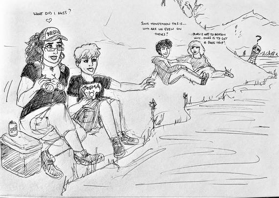 Four people sitting at the edge of Loch Ness, waiting for the monster to appear.