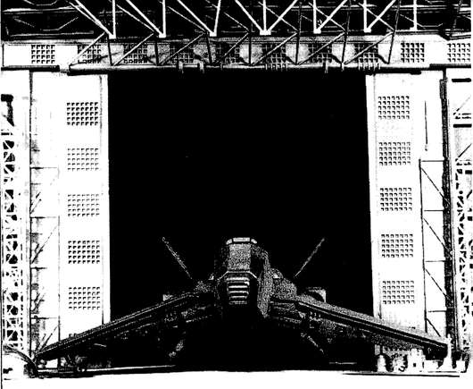 A black & white print of the C-104 Tomahawk from the video game Echelon. In the background there is a hangar.