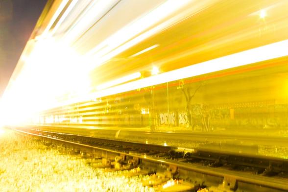 Streams of light as a train passes.