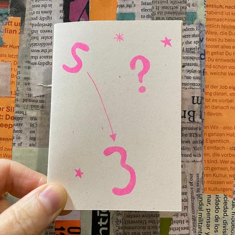 Another A7 riso-printed zine, with neon pink ink on grainy-looking cream recycled paper. On the cover it says 'S 3 ?'....which signifies that it's Setlist zine volume 3, with the theme of questions.