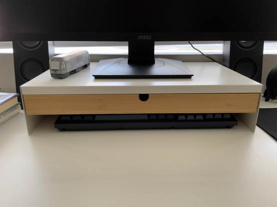 MSI monitor resting on an IKEA Elloven monitor stand
