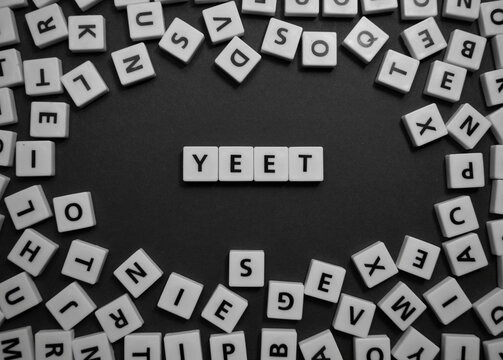 Photo of scrabble letters with in the centre "YEET" spelled