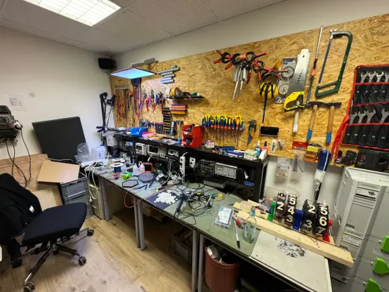 Electronics room well stocked with plenty of high quality soldering tools, oscilloscope, signal generator power supplies etc.