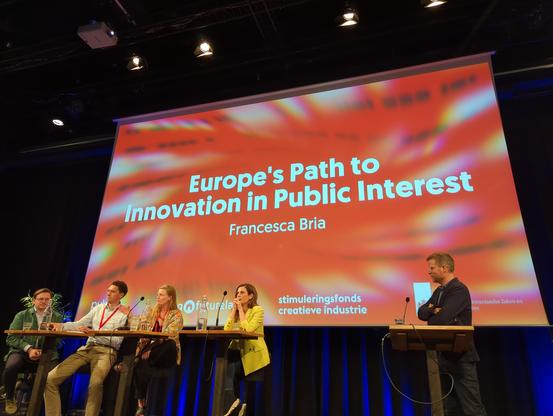 Slide on the screen: "Europe's Path to Innovation in the Public Interest"