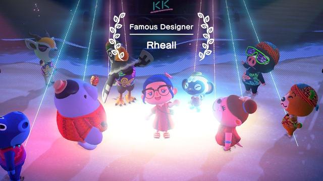 A close up of my Animal Crossing character in the centre of a throng of dancing animals, excitedly fist-pumping the air while lazer beams shoot around. Text appears on the screen saying "Famous Designer: Rheall"