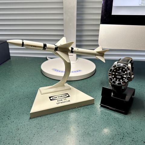 AIM-7F Sparrow missile model and wristwatch