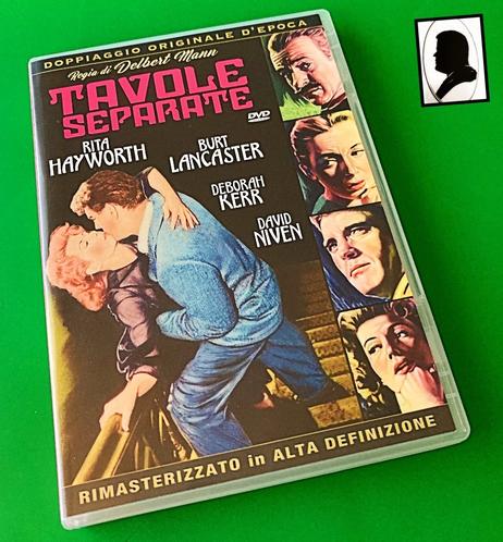 La foto ritrae la copertina del dvd del film con vari disegni che riproducono i primi piano dei protagonisti: David Niven, Deborah Kerr, Burt Lancaster e Rita Heyworth. Più grande il disegno con Lancaster e Heyworth che si baciano su una scala.