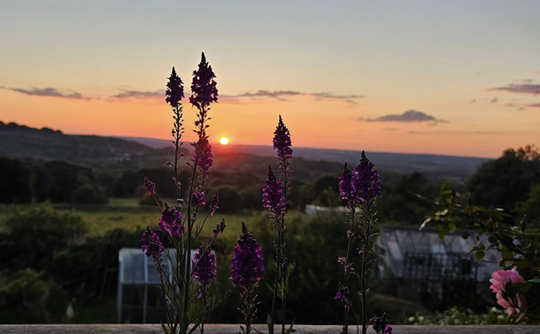 The view from our balcony. A sunset over the Brede Valley from our house in Hastings, with a sunset.
