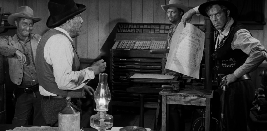 Lee Marvin giving editing advice to the editor of the town newspaper owner in The Man WHo Shot Liberty Valance.