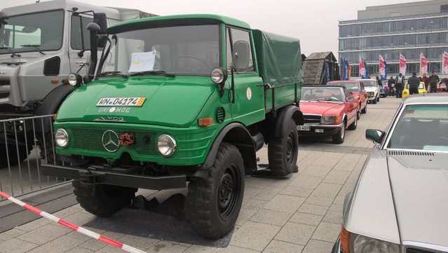 Green 1986 Unimog 406 (?), front quarter view