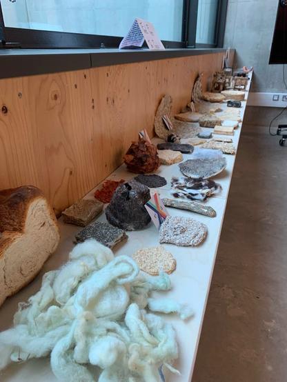 A row of samples on a shelf.